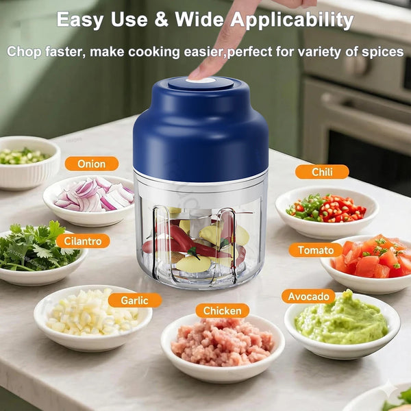 A blue portable electric food chopper is shown with various ingredients like onion, chili, tomato, garlic, and avocado in sur