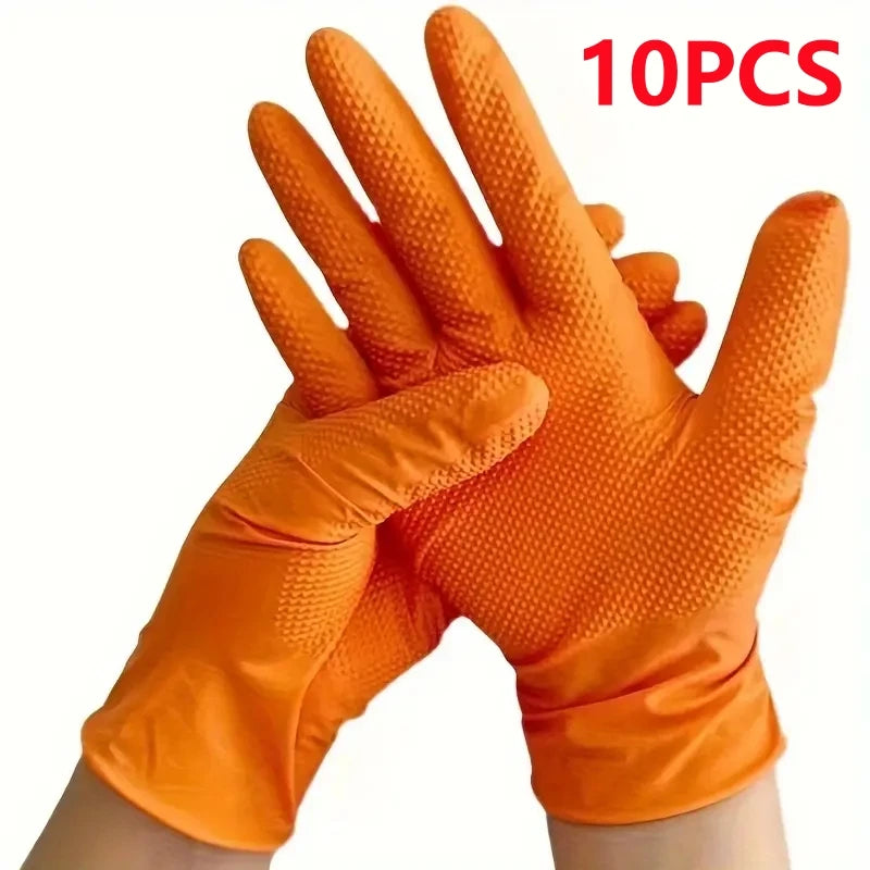 A hand wearing bright orange heavy-duty nitrile disposable gloves with a diamond texture, shown in a close-up view.