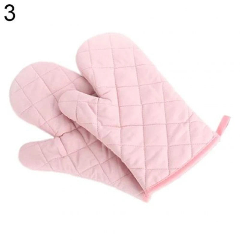 A pink quilted heat-resistant oven mitt is shown folded, ready for cooking or grilling.