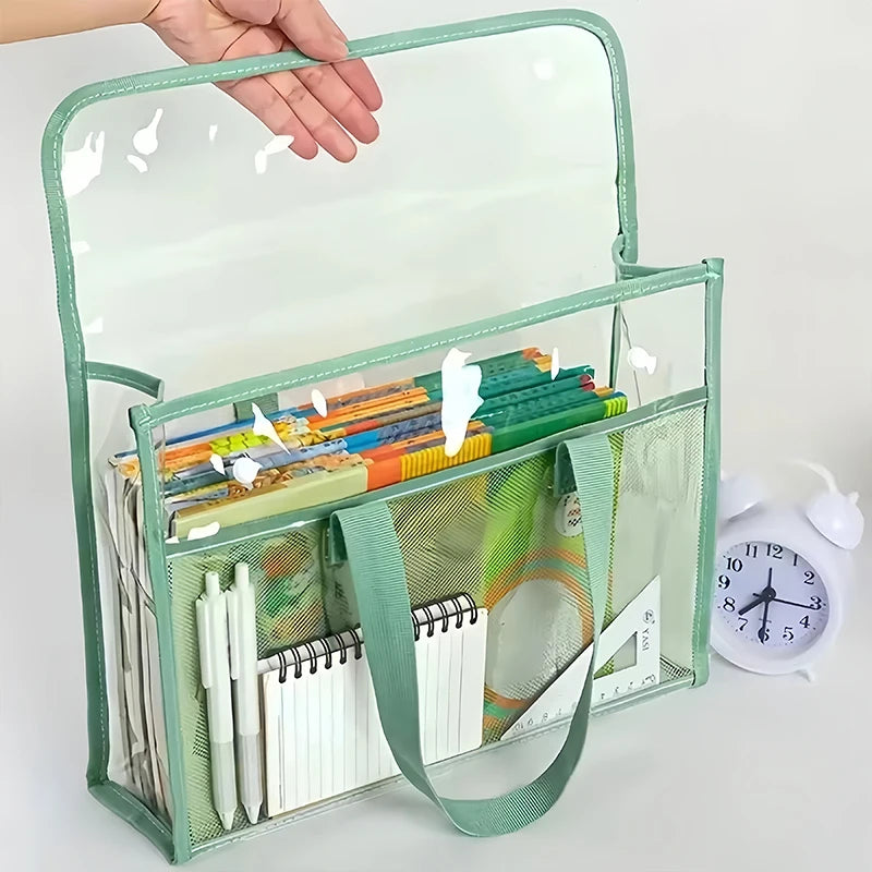 A clear, expandable document folder with a light green frame and a mesh pocket is shown open on a white surface.