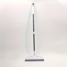 A long, slender broom with a white handle and a gray silicone scraper head is shown against a white background.