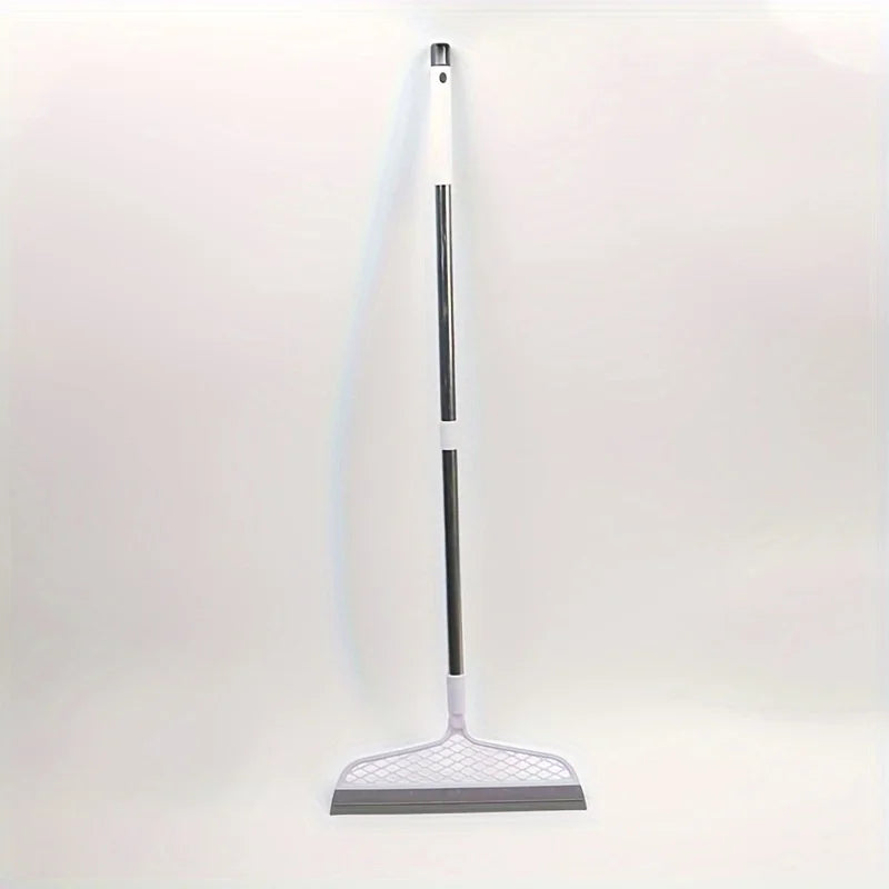 A long, slender broom with a white handle and a gray silicone scraper head is shown against a white background.
