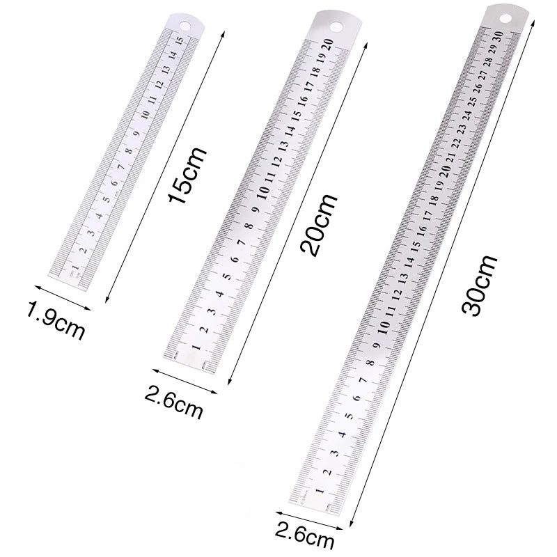 A stainless steel precision ruler showing measurements in centimeters and inches.