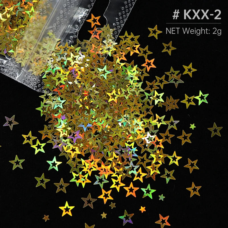 A pile of shiny holographic star sequins in various colors scattered on a black background.