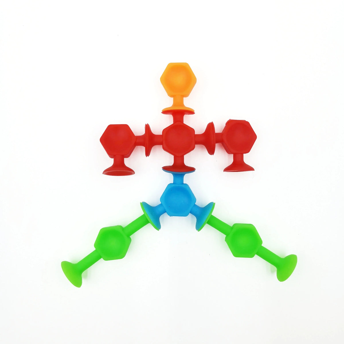 A set of soft silicone suction bath toys in various colors including orange, red, and blue.