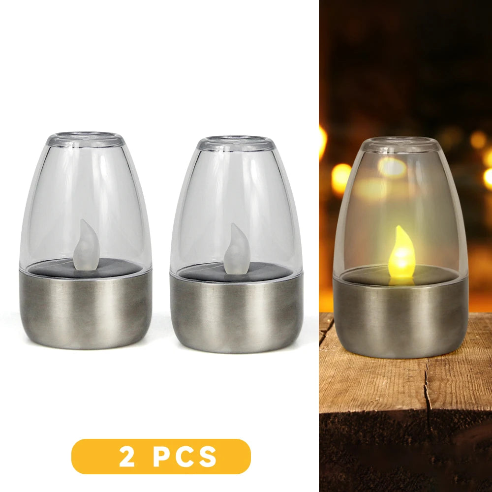 Two solar-powered flameless LED tea lights in silver metal holders, shown with and without light.