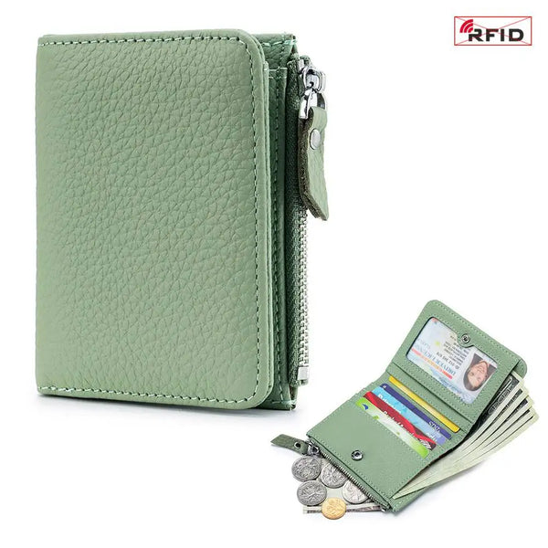 A green genuine leather slim bi-fold wallet with RFID protection shown in a close-up view.