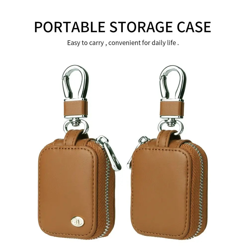 A pair of brown PU leather storage cases for earbuds with anti-lost hooks.