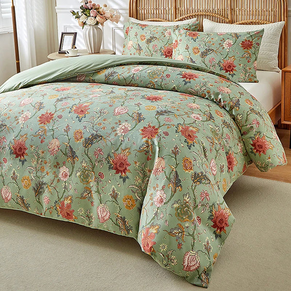 Vintage floral duvet cover set in sage green featuring pink and coral roses on a light neutral background.