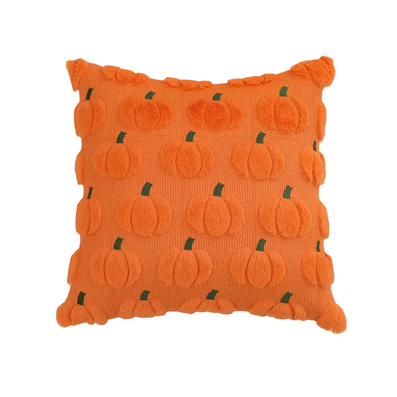 Orange plush throw pillow covers decorated with small pumpkin shapes.