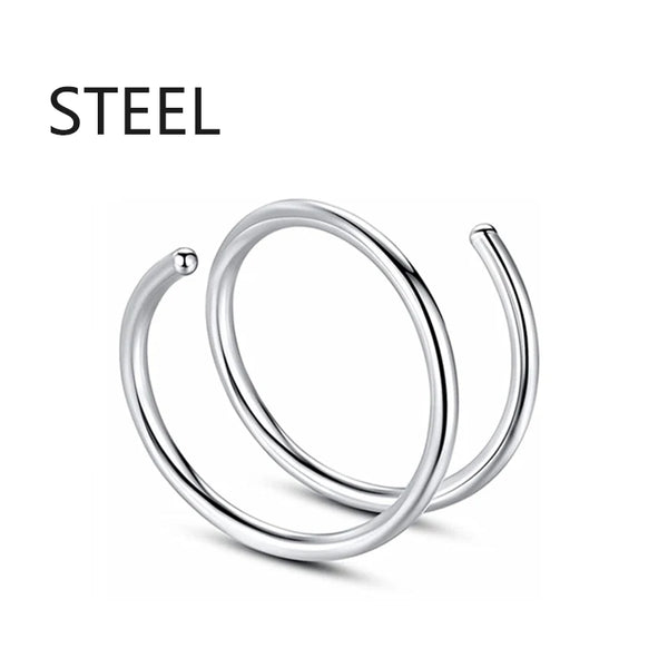 A silver steel septum ring is shown against a white background.