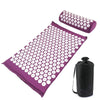 Purple acupressure mat and pillow set with white dots for pain relief and relaxation