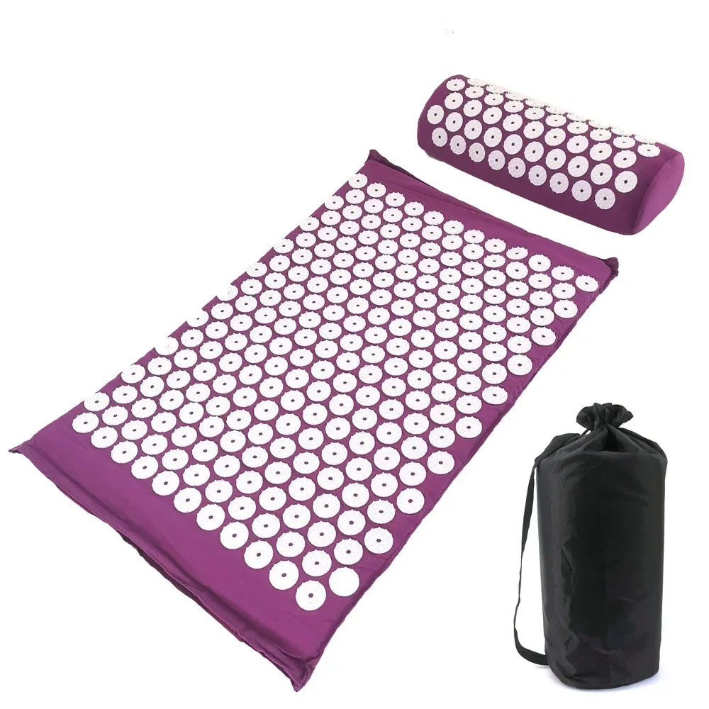 Purple acupressure mat and pillow set with white dots for pain relief and relaxation