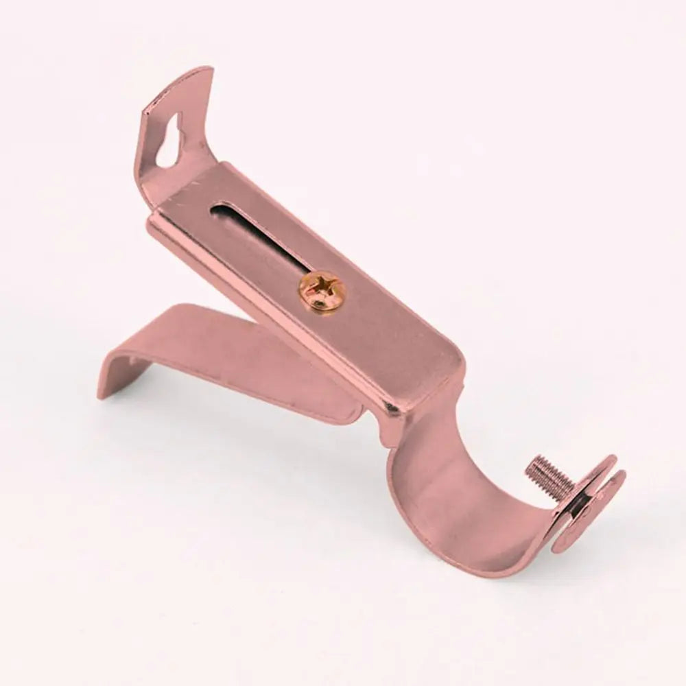 A rose gold metal curtain rod bracket with an adjustable wall mount support.