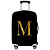 Black rolling suitcase with a gold letter M print on the side.