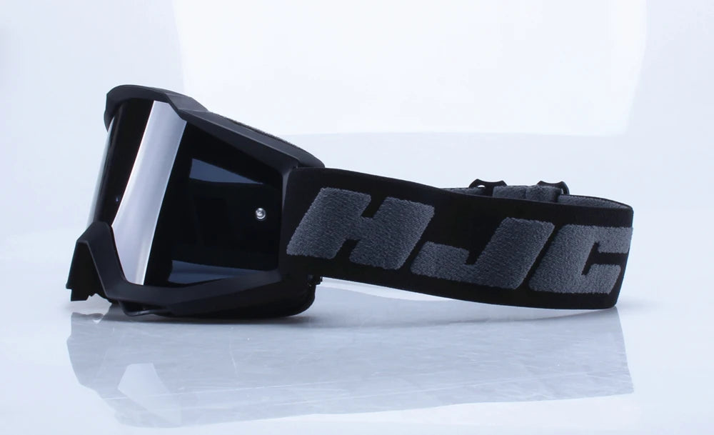 Black retro motorcycle sunglasses with night vision lenses and a black strap
