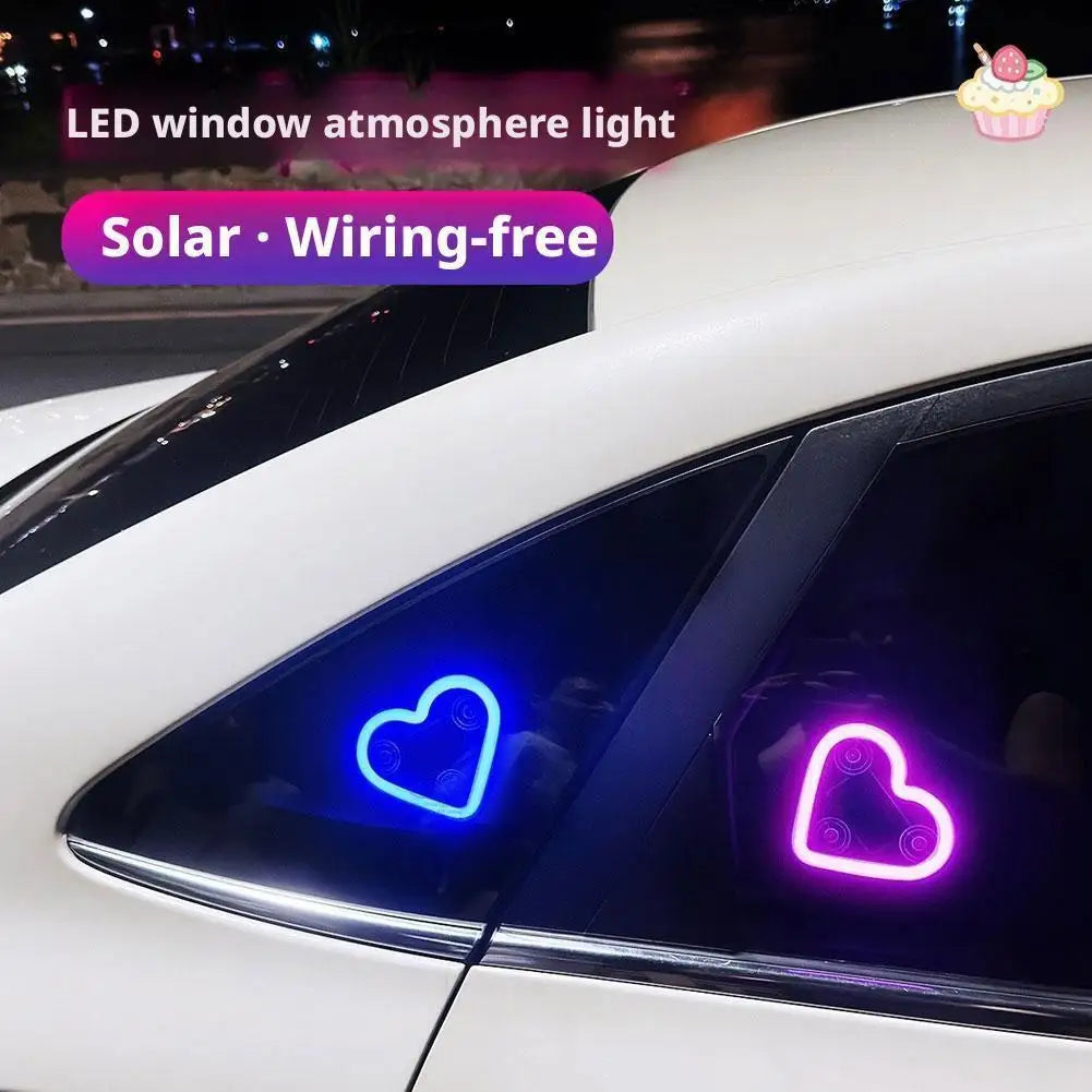 LED window atmosphere light featuring neon heart shapes illuminating a car window.