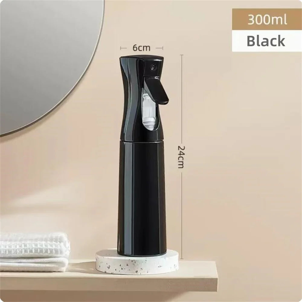 A black 300ml fine mist spray bottle is displayed on a shelf next to a mirror.