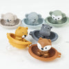 A collection of silicone animal finger puppets in various shades of gray, beige, and green, designed as bath toys for toddler