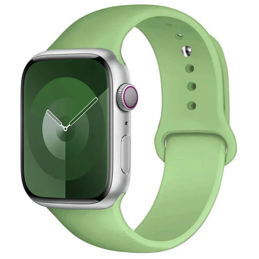 A light green silicone sport band for an Apple Watch shown on a white background.