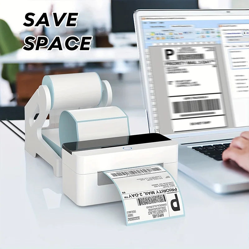 A white 2-in-1 thermal label holder is shown next to a laptop, with a fan-folded label in front of it.