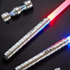 A silver metal lightsaber with a glowing pink and blue blade is shown against a dark background.