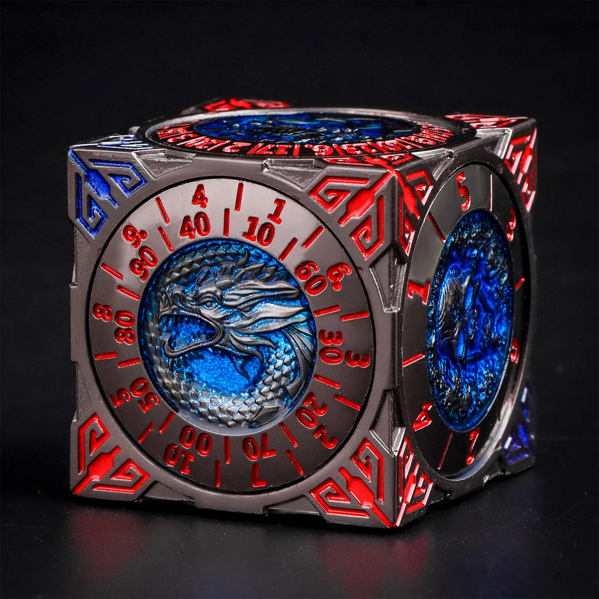 A premium metal spinner dice cube for D&D featuring red and blue accents and a central blue dragon design.