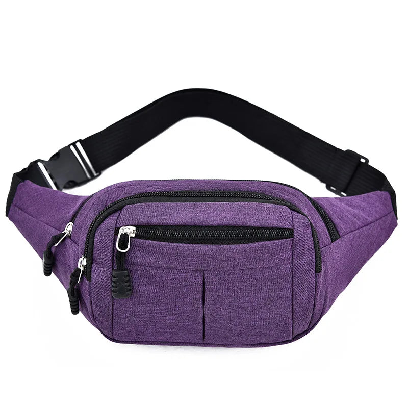 Purple canvas waist pack with black trim and zipper pockets shown from above