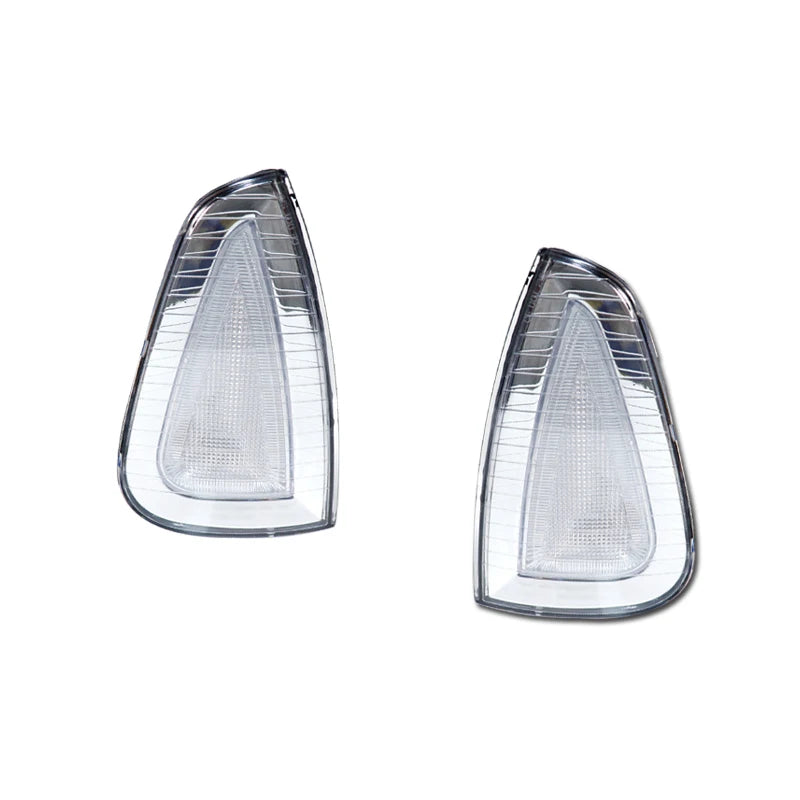 Clear plastic front side marker light housing for a Dodge Charger, showing the lens shape.