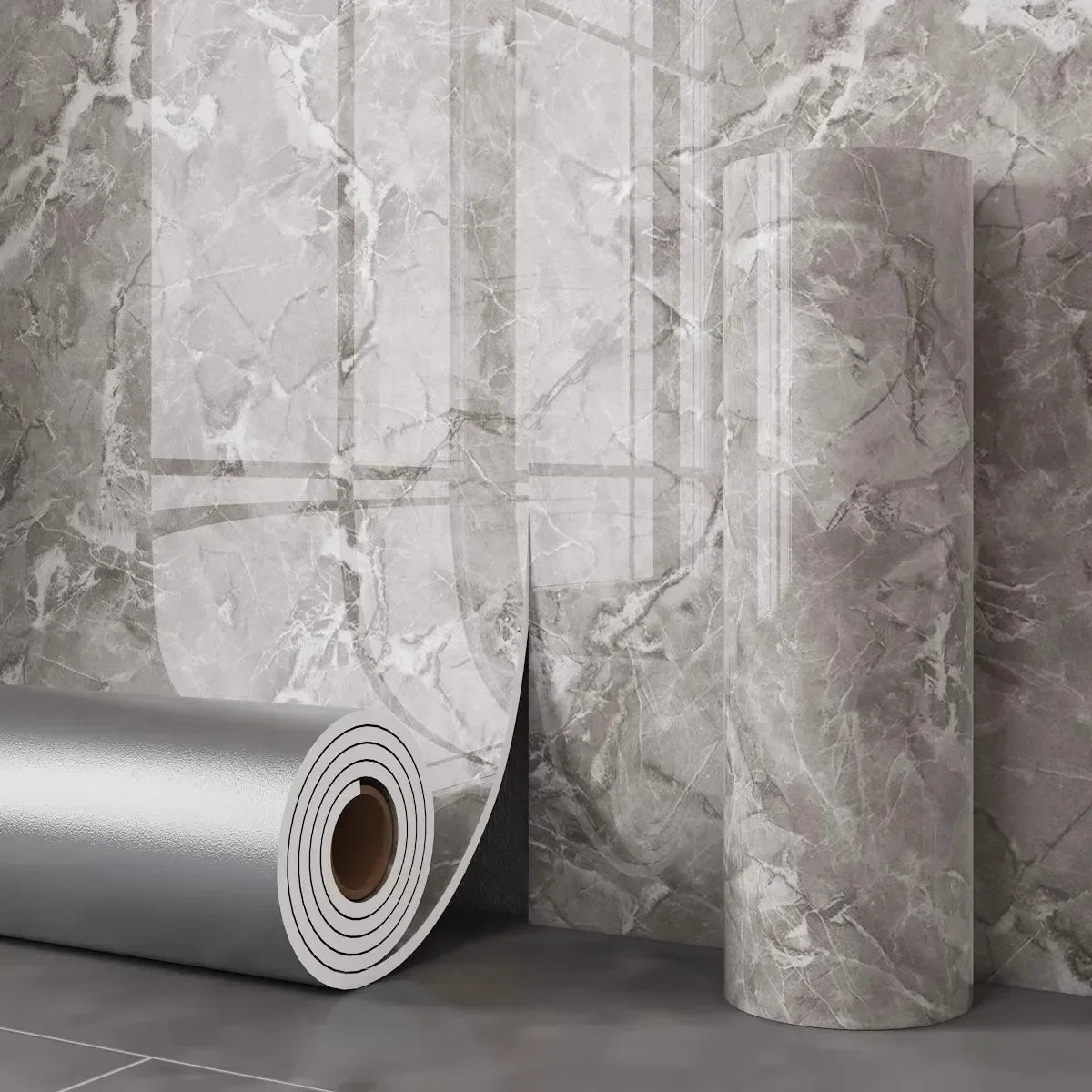 Roll of gray marble peel-and-stick waterproof wall panels displayed next to a cylindrical panel.