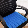A black chair with a blue honeycomb silicone seat cushion for pressure relief.