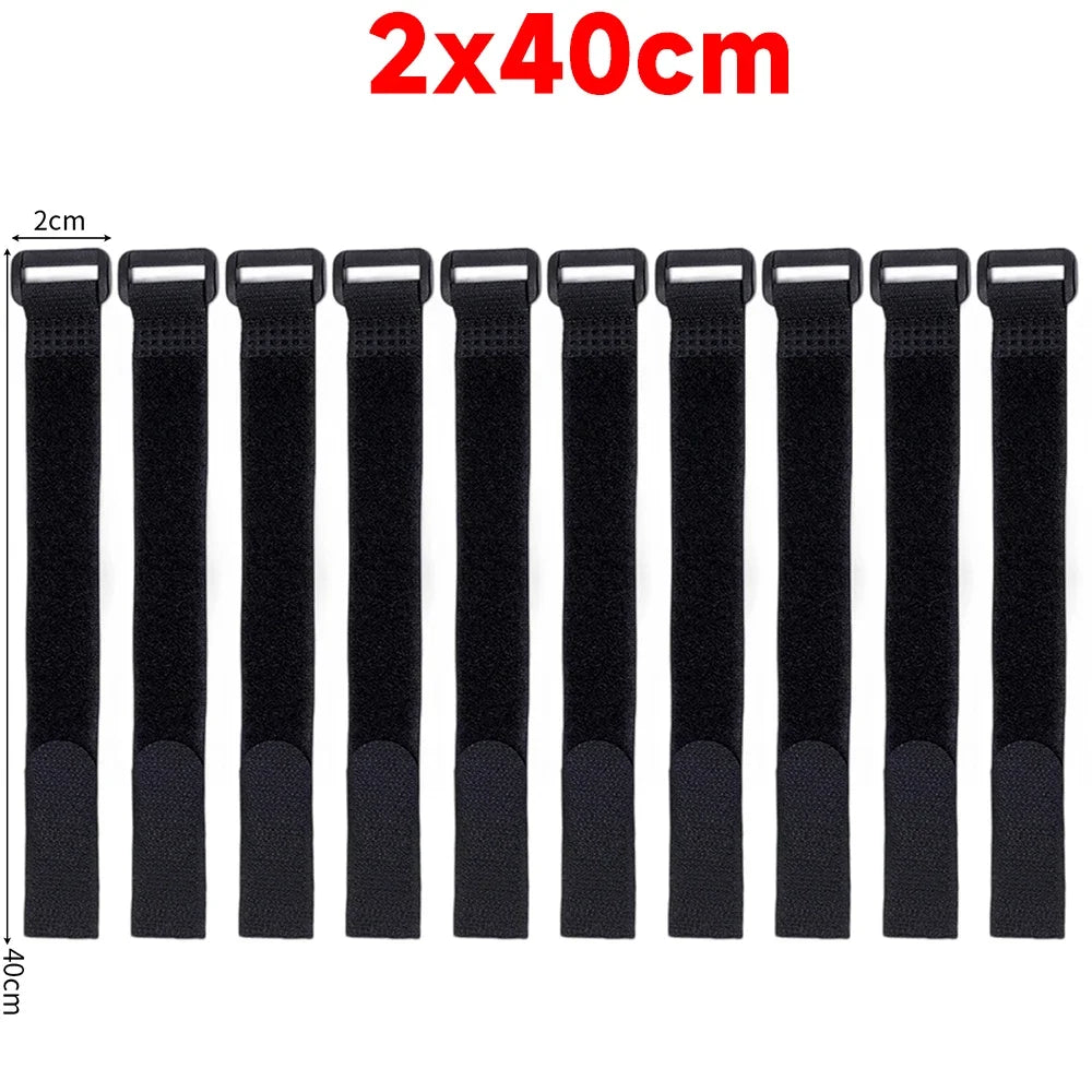 A set of twelve black reusable nylon cable ties with adjustable hook and loop fasteners shown vertically.