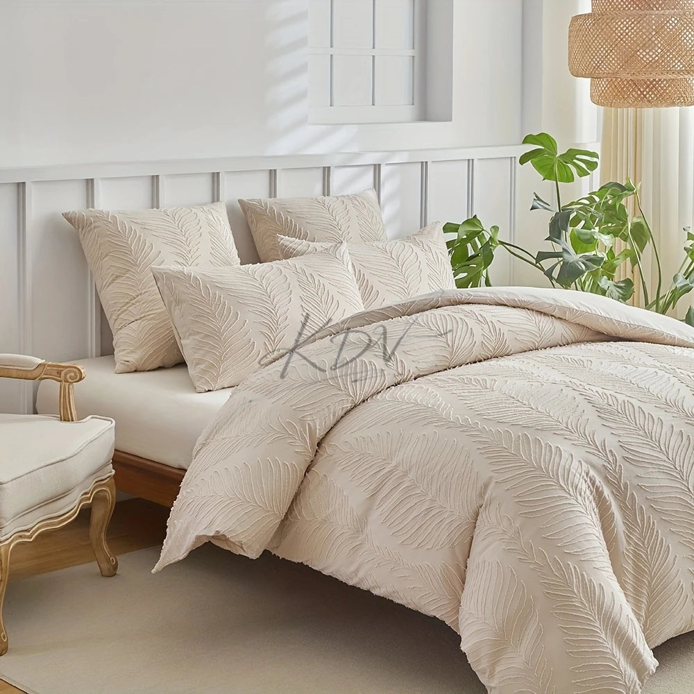 A beige embossed leaf pattern microfiber duvet cover set displayed on a bed with white paneled walls.