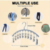 Stainless steel multi-use hanger with 10 clips for organizing various types of pants and clothing.
