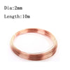 A coil of rose gold-colored enameled copper wire, 2mm in diameter and 10 meters in length.