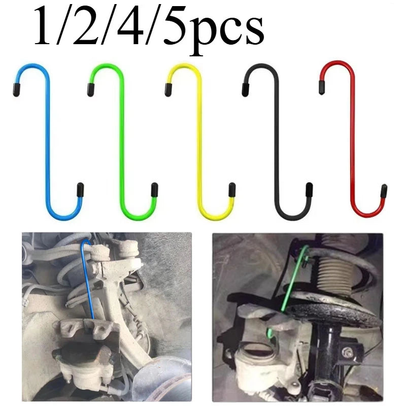 Five pieces of brake caliper hanger S-hooks in blue, green, yellow, and red for auto repair