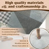 Nahaufnahme einer grau gemusterten Fußmatte, die hochwertige Materialien und Handwerkskunst zeigt.