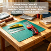 A 45mm rotary cutter sewing kit with a cutting mat, ruler, and knife laid out on a wooden table.