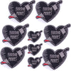 A set of ten black heart-shaped embroidered iron-on patches featuring the text Horror Movies and a stylized hammer design.