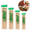 A set of natural bamboo skewers for BBQ and grilling, packaged with green labels.