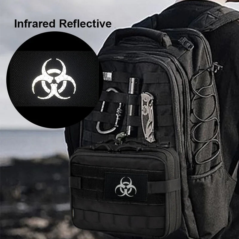 Black tactical backpack featuring infrared reflective patches with hook and loop backing