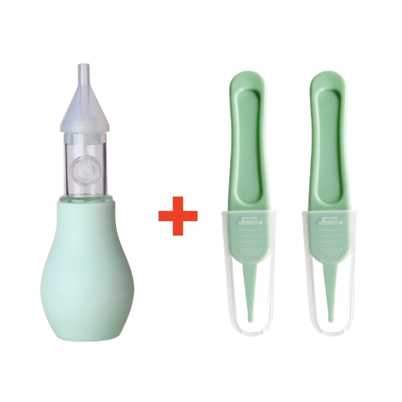 A gentle baby nasal aspirator in light green plastic with a silicone tip and a clear plastic container.