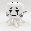 A white soft plush doll resembling a pixelated character face with stubby limbs.