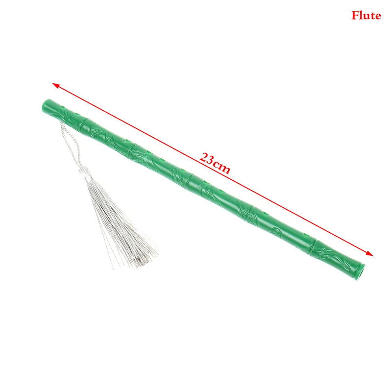 A green flute with a silver tassel, measuring 23cm, is shown for miniature musical instrument decor.