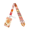 A colorful lanyard featuring a repeating pattern of suns and moons, attached to an ID badge holder.