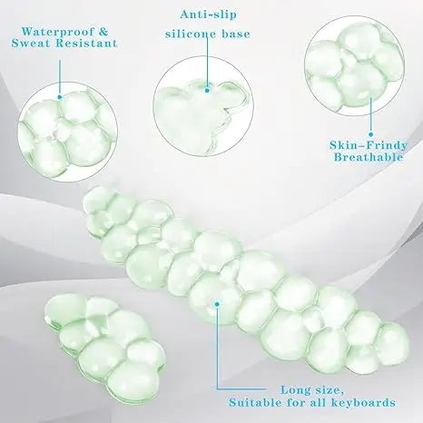A set of translucent, cloud-shaped ergonomic wrist rests designed for keyboards and mice.