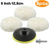 Five white wool car polishing pads with black backing pads and a drill adapter