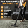 A person is using a yellow cordless vacuum cleaner on a carpet.