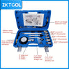 Blue engine cylinder compression tester kit with various adapters and rods for testing.