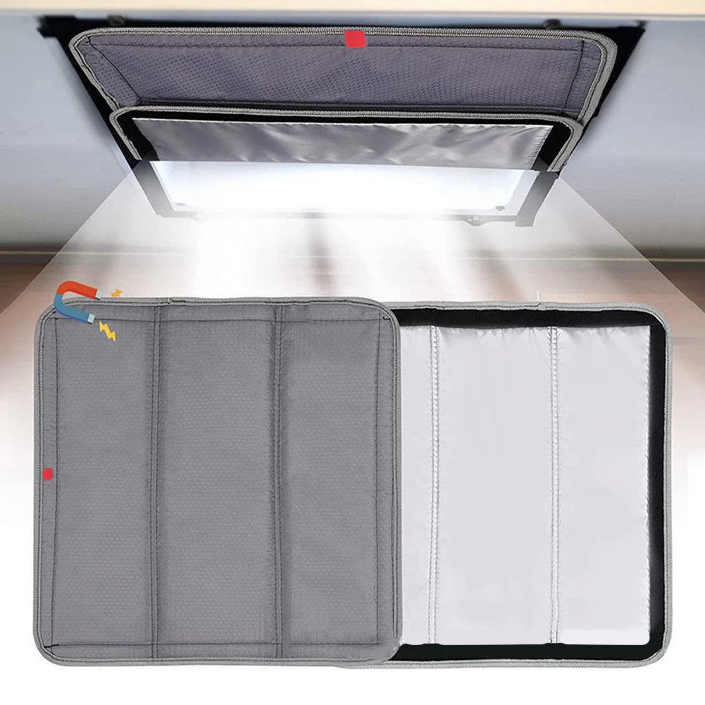 Foldable RV skylight sunshade with reflective insulation shown in an open, angled view.